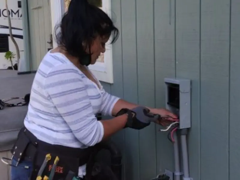 Licensed electrician wiring an exterior subpanel in Lower Paxton