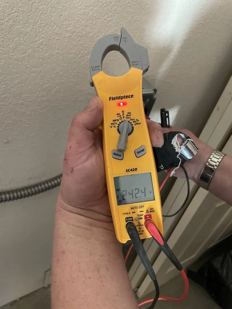 Voltage testing with clamp meter during Generator Installation in Lower Paxton